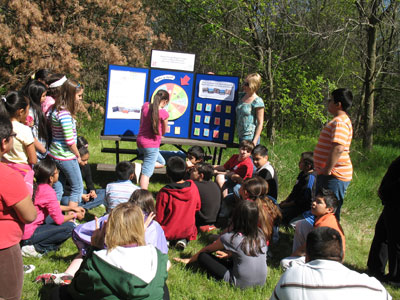 Outreach Specialists leads a group of students in an interactive drought game.