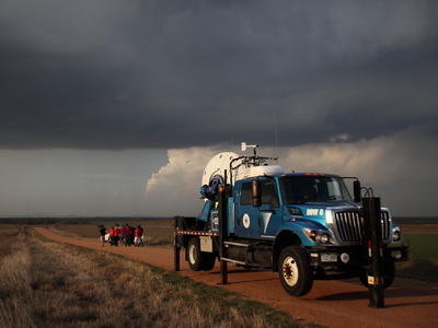 Students observe an approaching supercell in southwest OK near the Doppler on Wheels (DOW) mobile radar.